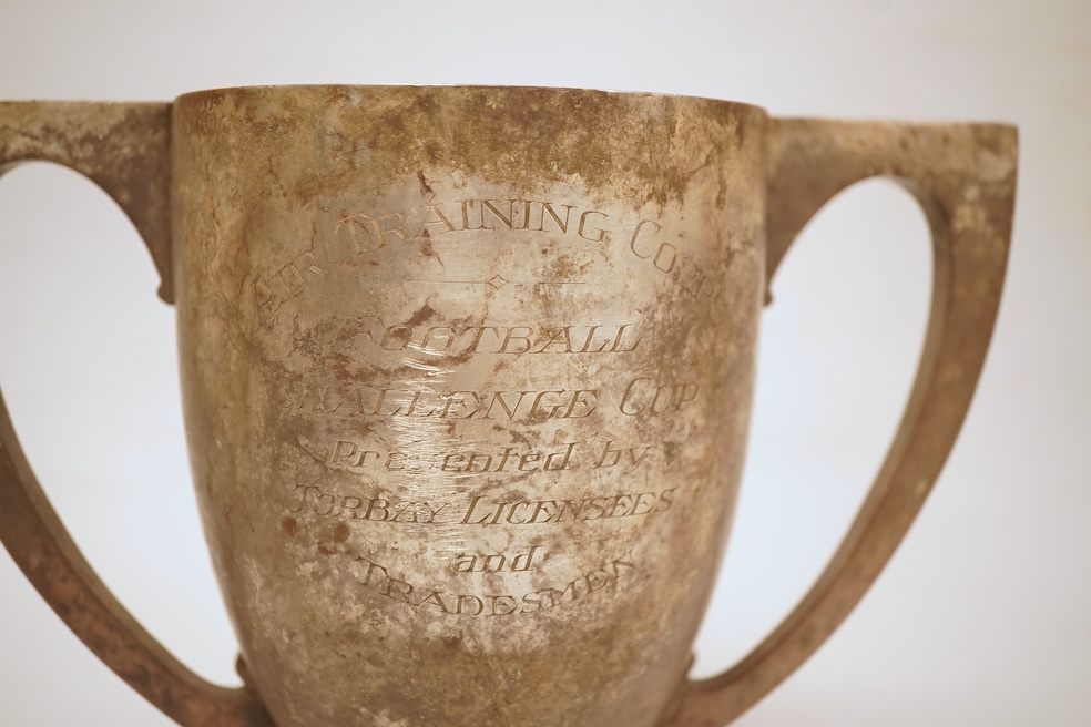An Art Deco silver two handled presentation trophy cup, with engraved inscription, Adie Bros. Birmingham, 1928, height 17.4cm, 21oz.
